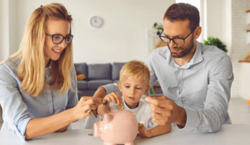 parents with their child and a piggy bank