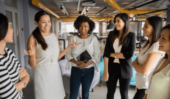 diverse businesswomen talking