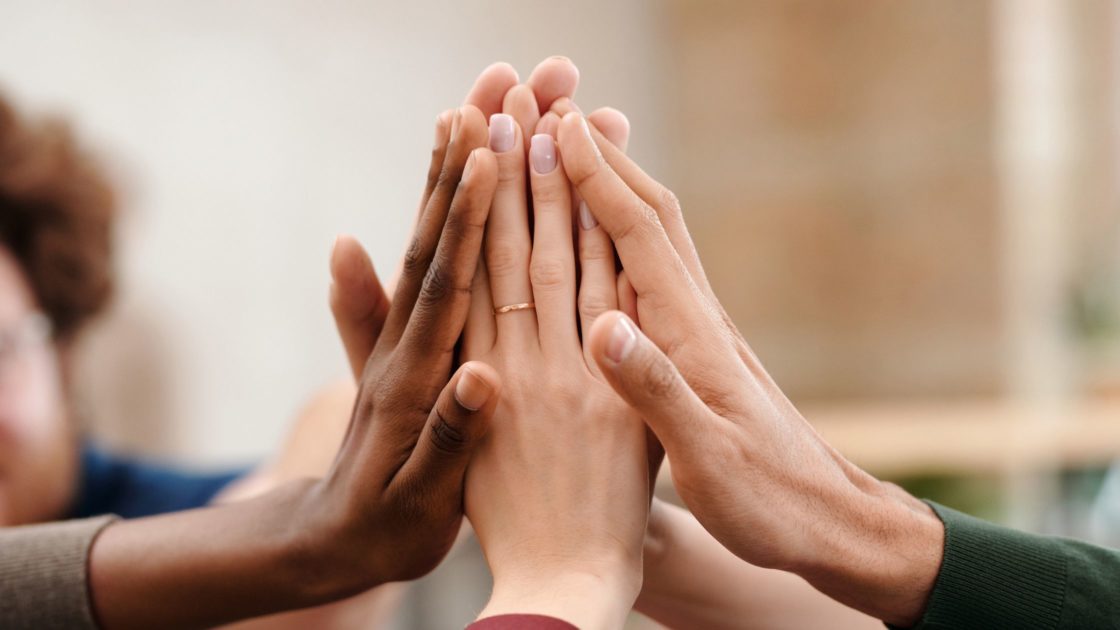 Testimonials for Fusion Diverse hands high-five
